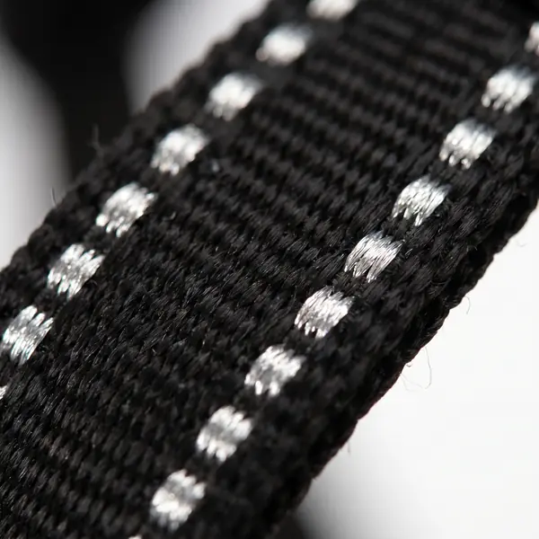 Close-up of the reflective stitching on the harness webbing